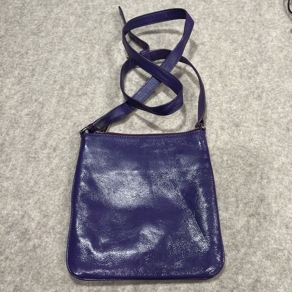 COLE HAAN Jitney II Ziptop Swingpack Crossbody Bag Purple Patent Leather - Picture 4 of 11